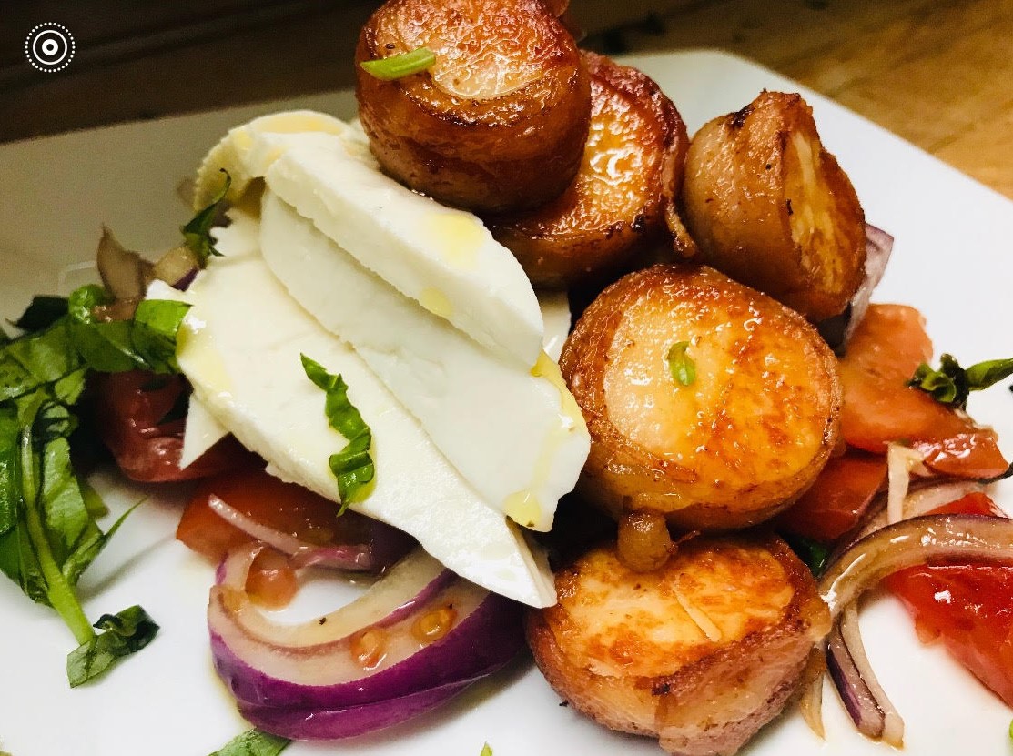 Scallops wrapped in bacon.